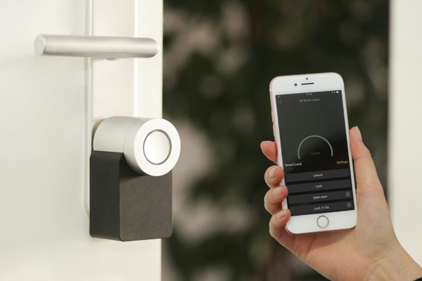 How can you implement an automated home security system in a UK urban apartment?
